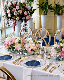 Elegant wedding tablescape with pink florals and gold accents