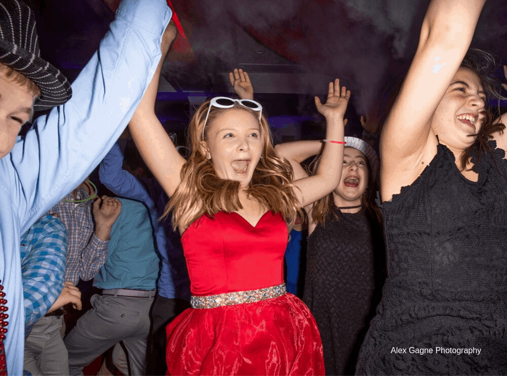 Kids dancing at a mitzvah celebration